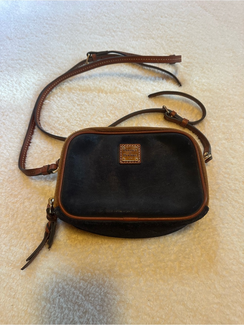 Dooney & Bourke Navy Blue Leather Crossbody with Brown Trim and Gold Plaque